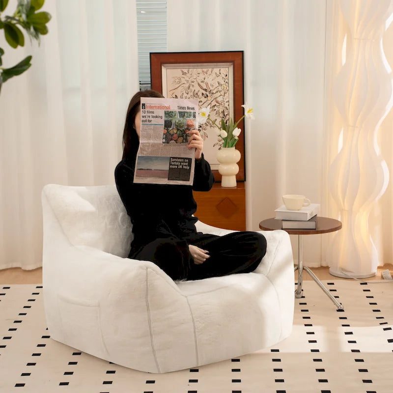 Fauteuil poire en fausse fourrure avec soutien lombaire, garnissage en mousse déchiquetée haute densité et design polyvalent