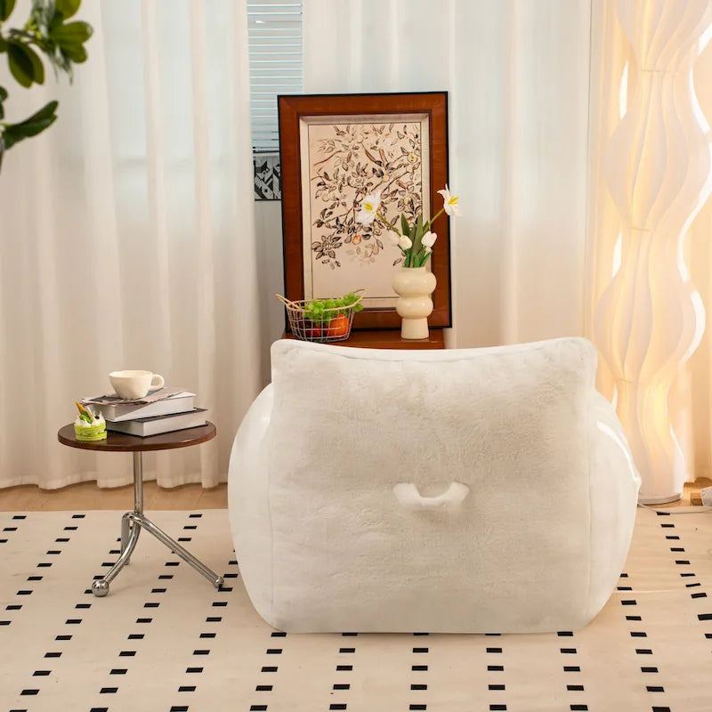 Fauteuil poire en fausse fourrure avec soutien lombaire, garnissage en mousse déchiquetée haute densité et design polyvalent