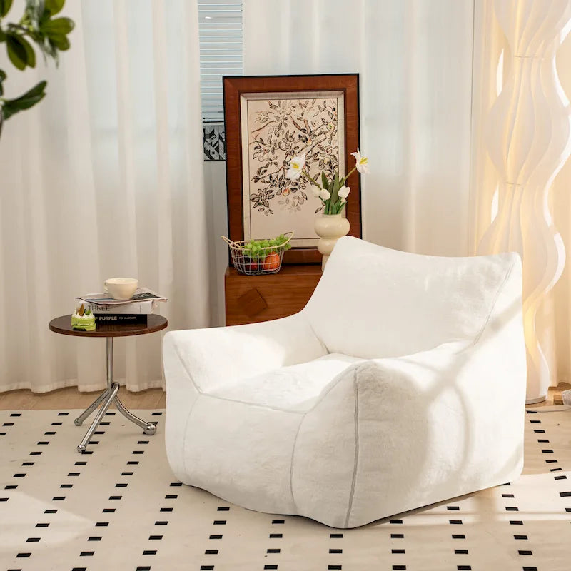 Fauteuil poire en fausse fourrure avec soutien lombaire, garnissage en mousse déchiquetée haute densité et design polyvalent